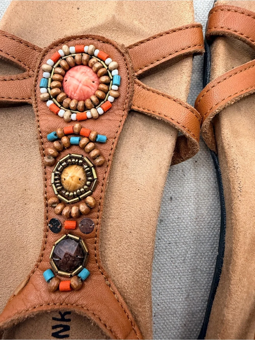 Minnetonka Women's Tan Beaded T-Strap Sandals